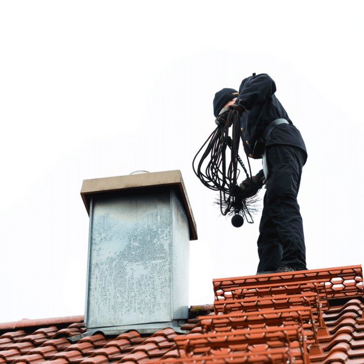 Chimney Sweep on Roof